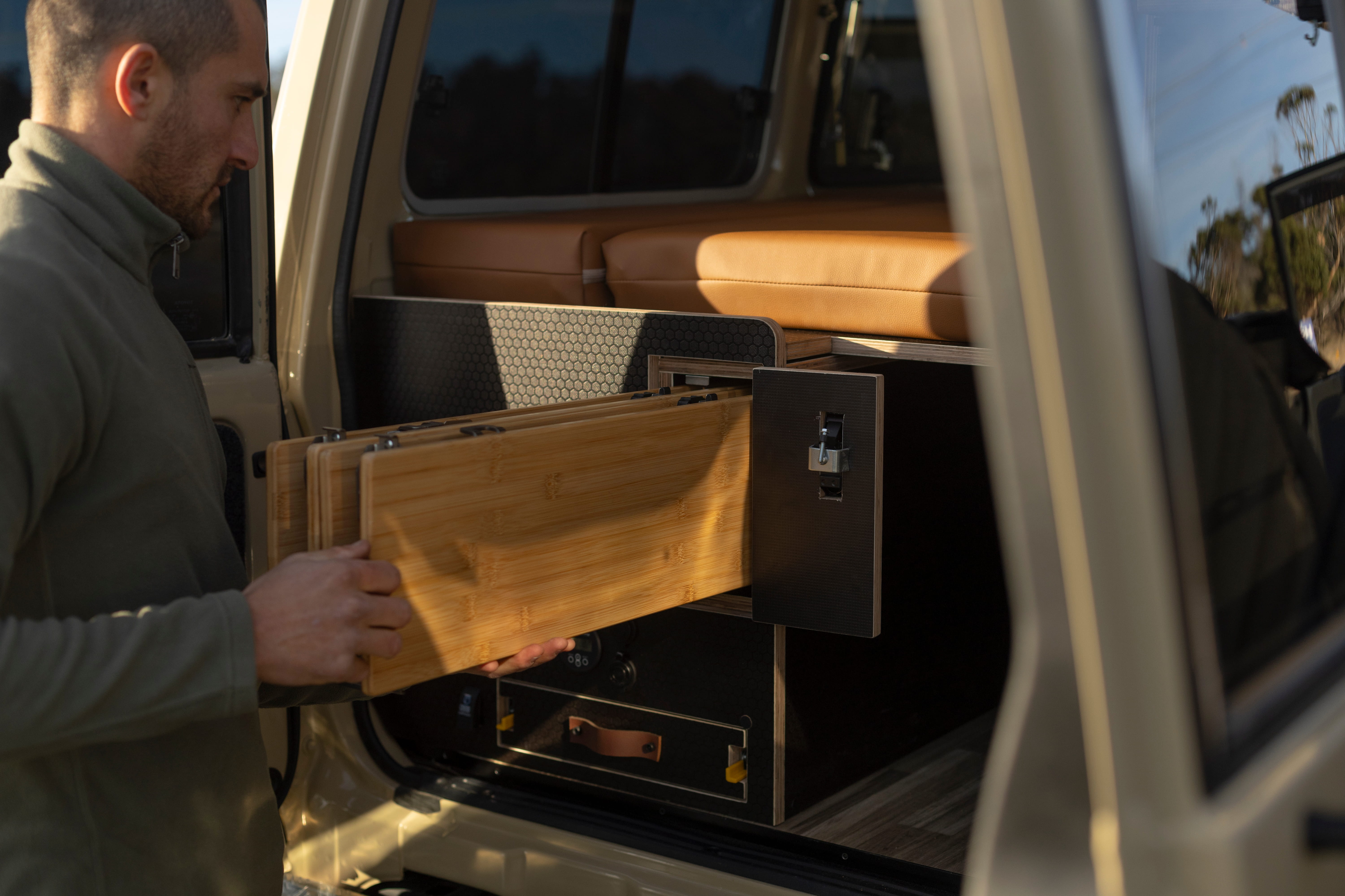 Slide-out table storage — Paul's Troopy fitout