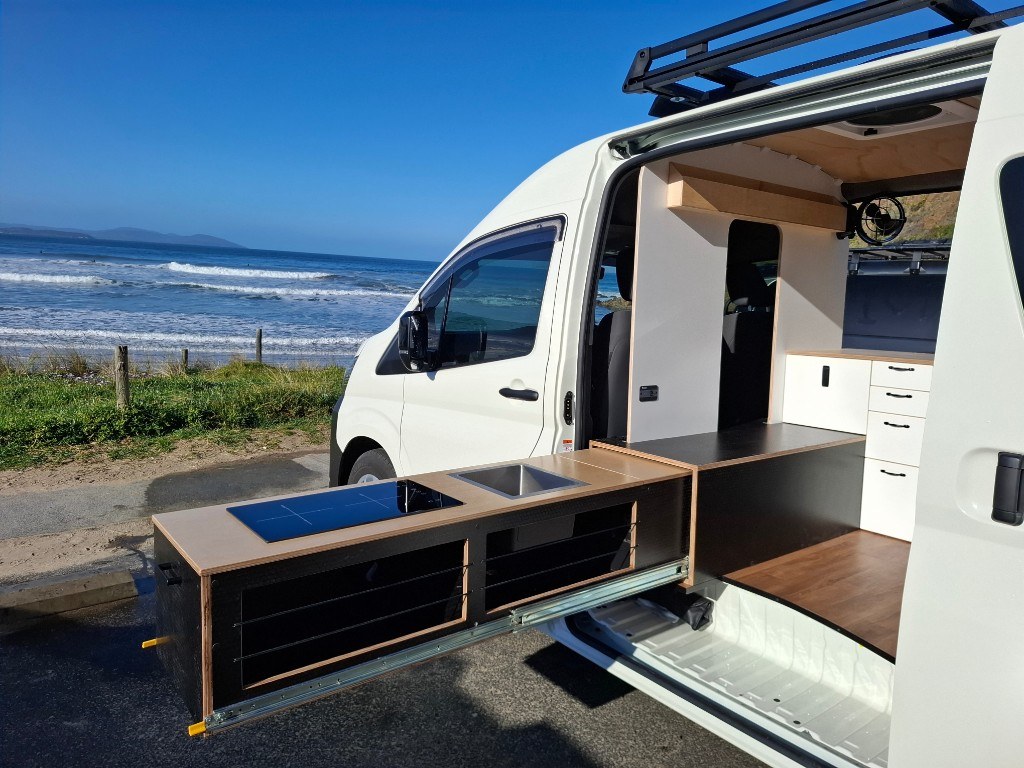 Coastal HiAce fitout with slide-out kitchen